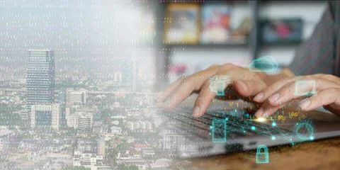 Digital technology and cloud computing: concept. A man using his laptop to .. Stock Photos