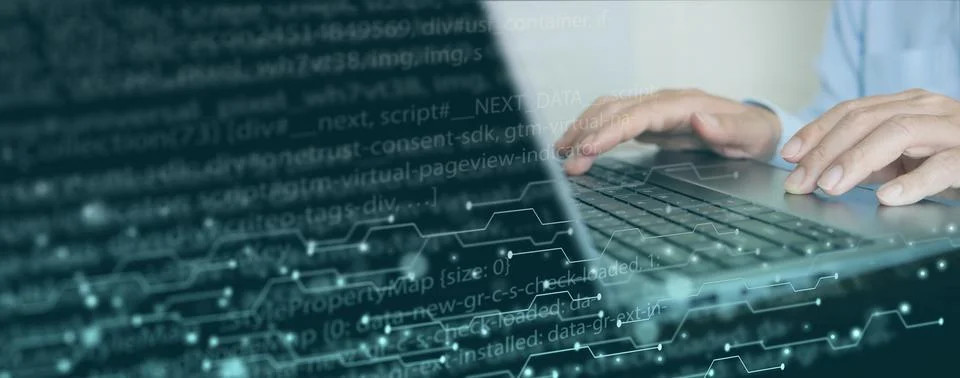 Digital technology and software development: A programmer coding and engine.. 스톡 사진