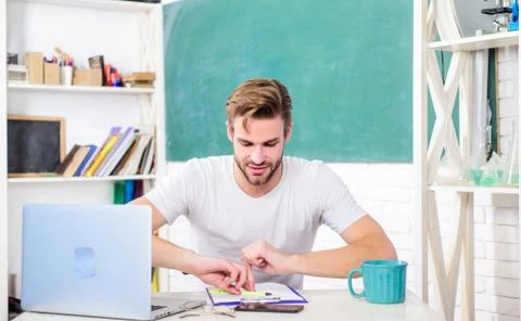 Digital technology. Apply online programming course. Handsome man use modern Stock Photos