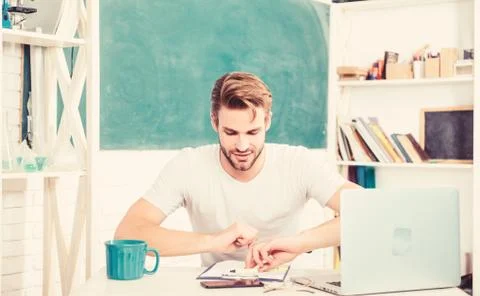 Digital technology. Apply online programming course. Handsome man use modern Foto stock