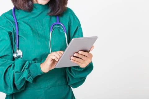 Digital technology with Doctor using tablet with white background. Stock Photos