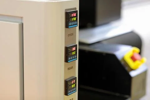 Digital temperature controllers on a control panel Stock Photos