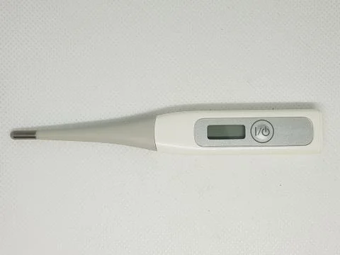 A digital thermometer on a white background Stock-Fotos