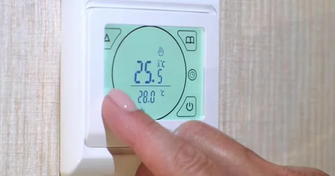 Digital thermostat with modes for precise temperature regulation and control Stock Footage 315339986