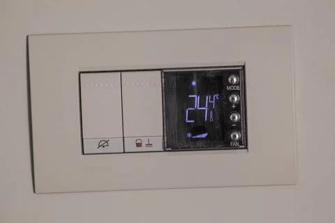  Digital thermostat used to regulate the temperature of the heating system... Stock Photos