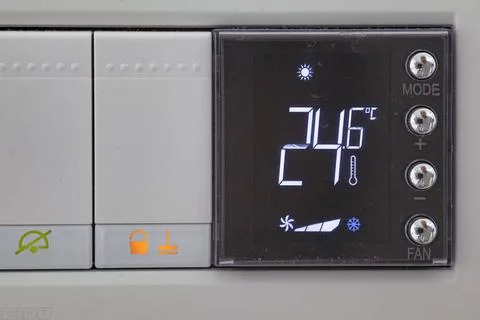  Digital thermostat used to regulate the temperature of the heating system... Stock Photos