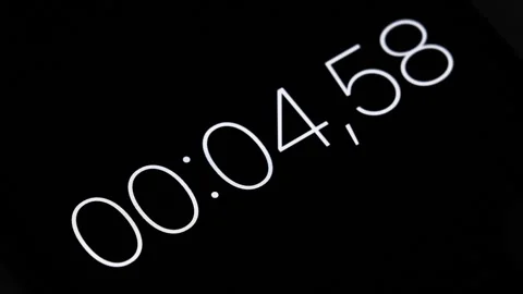 Digital timer counts from zero to ten seconds on a black screen illustrating 스톡 동영상 341826691