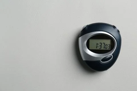 Digital timer on light grey background, top view. Space for text Foto stock
