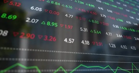 Digital trading screen displaying prices and line graph at desk, highlighting Stock Photos