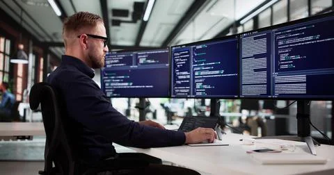 Digital Transformation Specialist Working On Coding Language At Office Comput Stock Photos