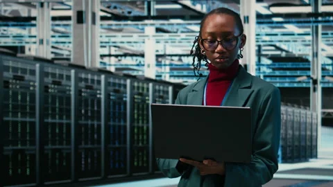 Digital twin virtualization, laptop and happy employee in data center Stock Footage 329453053