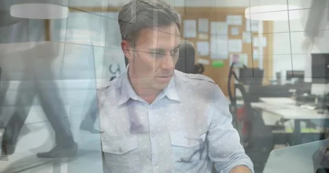 Digital video shows a man programming with global business tech and networking 스톡 동영상 327781599