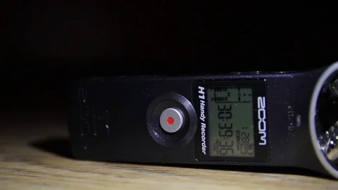 Digital voice recorder closeup on the dark background Stock Footage 73700628