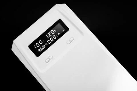 Digital voltage and current display on powerbank with battery percentage Stock Photos