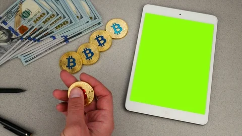 Digital white tablet with green screen and bitcoin Stock Footage 94001298