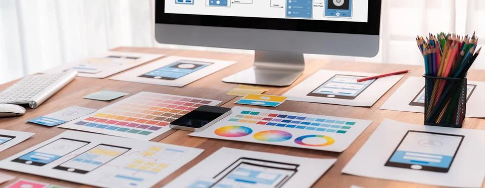 Digital wireframe design for web or mobile app UI on laptop. Scrutinize Stock Photos