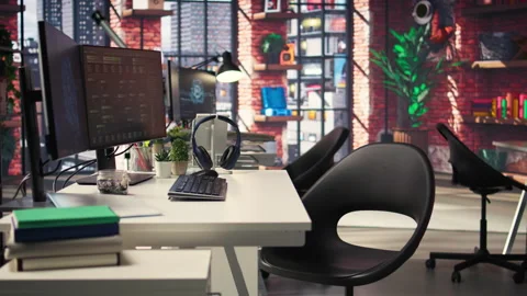 Digital workstation features multiple PC monitors running artificial Stock Footage 308605545