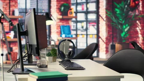 Digital workstation features multiple PC monitors running artificial Stock Footage 308671277