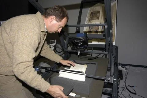  digitalisation of books, the scanning of books with a book scanner digita... Stock Photos