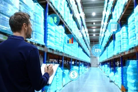 Digitalization. Manager working at warehouse. Photo with user interface overl Foto stock