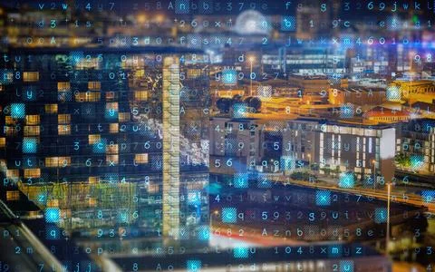 Digitally generated binary code against cityscape Stock Photos