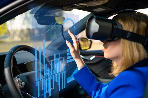 Digitally generated graphics and charts interface managed by business woman in Stock Photos