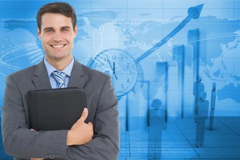 Digitally generated image of businessman standing against graphs and employees Stock Photos