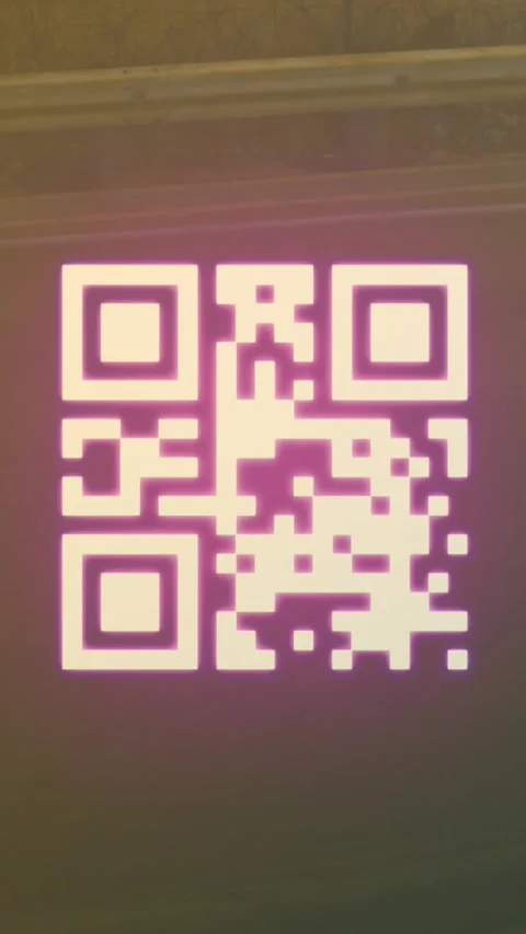 A digitally generated image of a qr code with neon elements flashing on a black Stock Footage 321666861