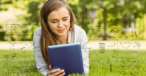 Digitally generated image of various equations with smiling college student Foto stock