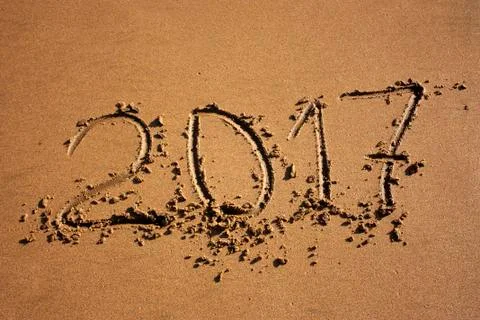 Digits in the sand in 2017 Stock Photos