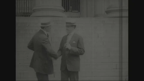 Dignitaries greet each other with formal handshake - 1918 Stock Footage 83663897