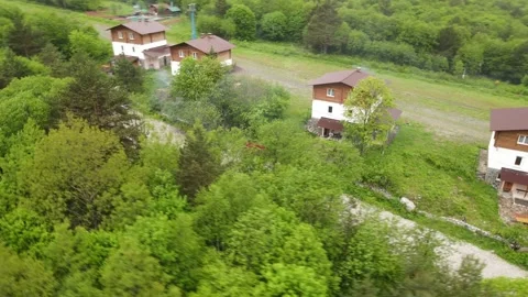 DIGORA GORGE, NORTH OSSETIA - MAY 31, 2024: Aerial view of tourist resort Stock Footage 337462701