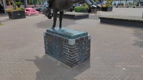Dik Trom op de ezel statue in Hoofddorp The Netherlands at the market square Stock Footage 202265969