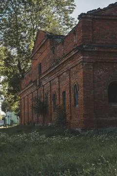 A dilapidated brick stable building. 19th century buildings Stock Photos