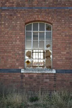 Dilapidated Brick Wall With Broken Arched Window, Bulcote, Nottinghamshire, Stock Photos