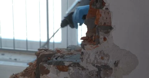 Dilapidated brickwork, small fragments of brick move from vibration, demolition Stock Footage 124306125