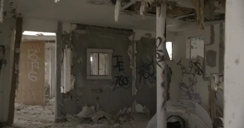 Dilapidated House Interior Rooms and Graffiti - Tilt Up and Crash Zoom Stock Footage 89941987