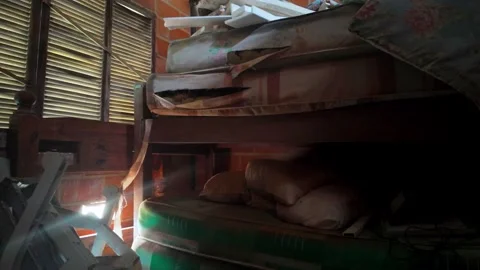 Dilapidated interior of a forgotten humble room with a worn-out bunk bed and Stock Footage 341750298