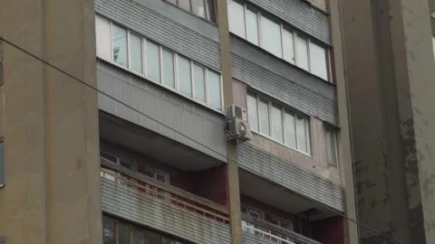 Dilapidated post-Soviet building close-up. A dilapidated tenement building with Fotos de archivo