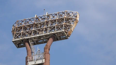 Dilapidated rusty giant lamp stand in the stadium during the day Stock Footage 108492782