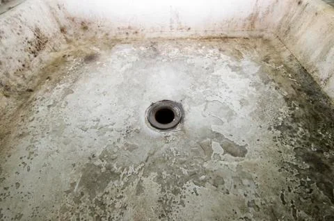 Dilapidated shower hole Stock Photos