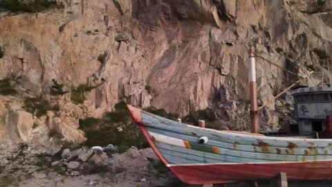 A dilapidated small boat on land Stock Footage 319553642