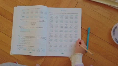 Diligent Elementary Student Practicing Arithmetic: Focused Home Education &amp; Stock Footage 326021565