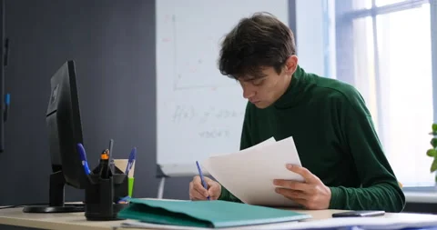 Diligent office worker prepares a budget report Stock Footage 146902176