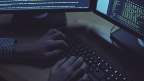 Diligent programmer writing a code at night Video stock 75018435