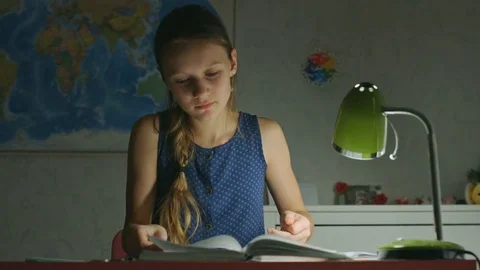 A diligent student studying at home Stock Footage 82422575