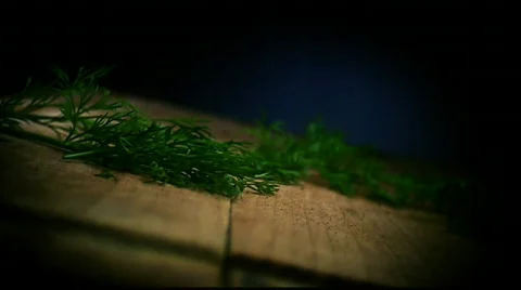 Dill falling on Kitchen Board Stock Footage