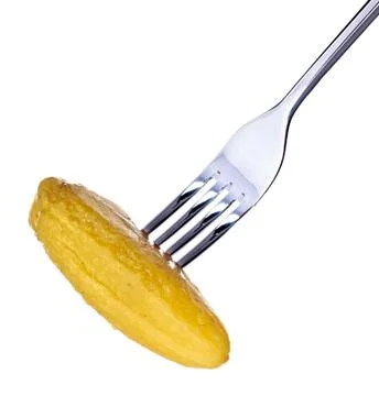 Dill pickle on fork Foto stock