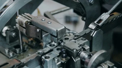 Dilution of teeth of a file on a automated machine,, close-up shot. Stock Footage 129299014
