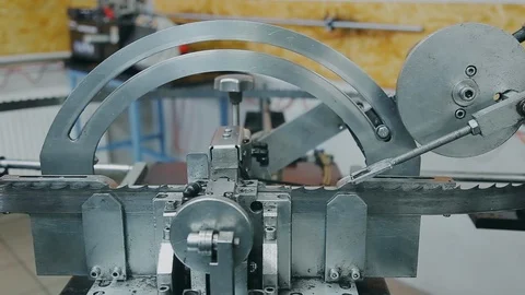 Dilution of teeth of a file on a automated machine,, close-up shot. Stock Footage 129299509